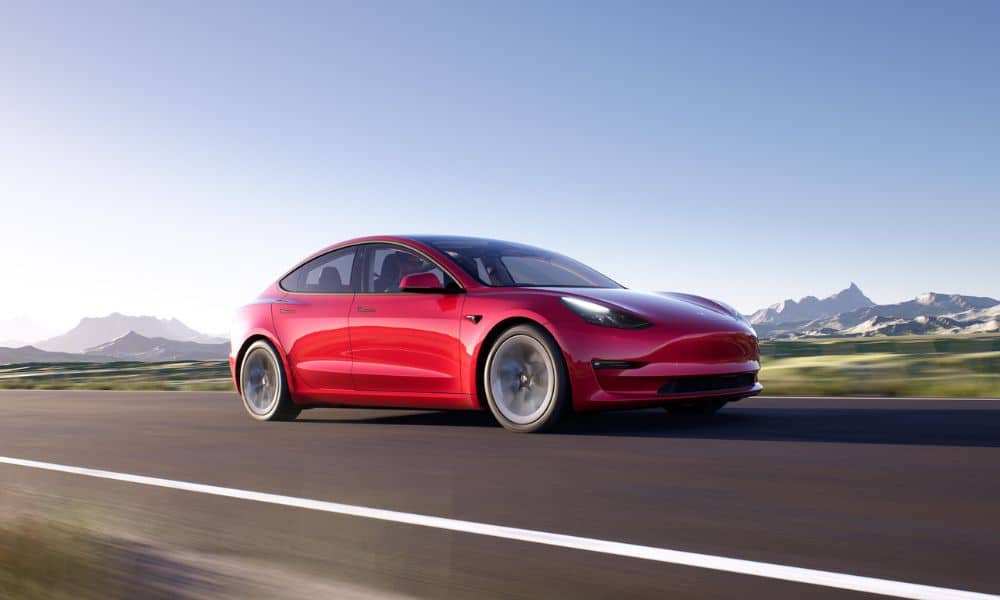 A red Tesla Model 3