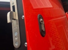 close up of deadlock on red vehicle